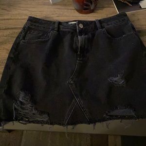 Black distressed jean skirt
